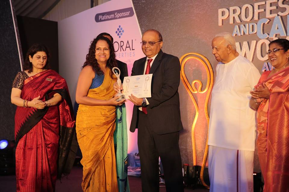 Sheron Jayasundara receiving the award