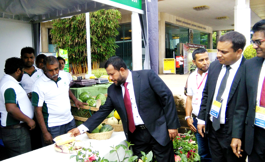 Minister of Industry and Commerce Rishad Bathiudeen inspects agri-produce  on display at the 16th Pro Food Pro Pack Ag-Biz international expo on the morning of 4 August.at BMICH Colombo.