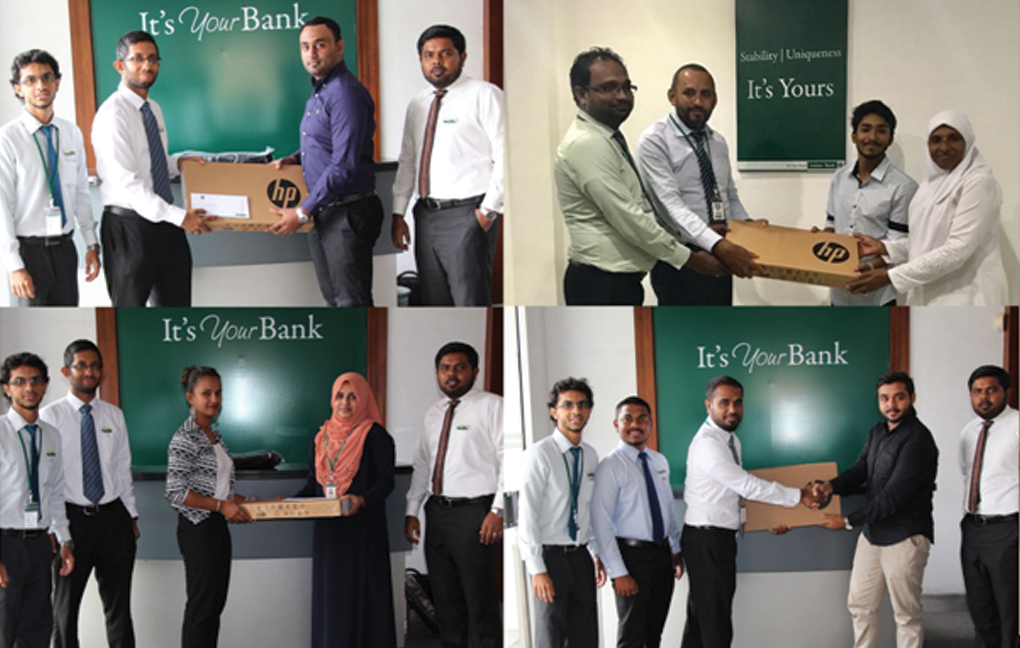 Education-Finance-Winners-receiving-their-laptops-from-Amana-Bank-Officials