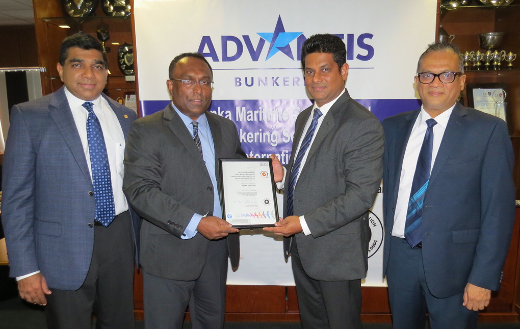 Chamika Wimalasiri, Business Manager - SGS Lanka (third from left), handing over the OHSAS certificate to Praneeth Gunawardena, Director - Advantis Bunkering (second from left), in the presence of Ruwan Waidyaratne, Managing Director - Hayleys Advantis (extreme left) and Shano Sabar, Group Director - Hayleys Advantis (extreme right)