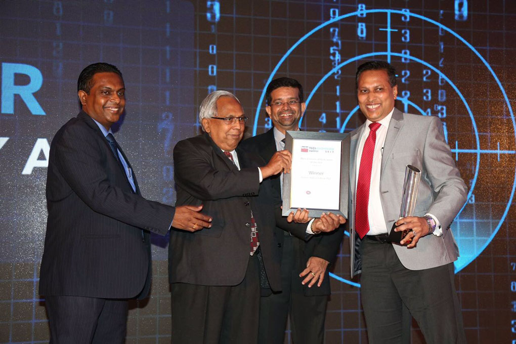 Picture shows Sidath Wijeratne, Chief Digital Officer, HNB accepting the award from Sarath Silva, former Chairman of LankaClear (Pvt) Ltd.   Channa de Silva, General Manager/CEO of LankaClear (Pvt) Ltd and Sunimal Weerasooriya, former General Manager/CEO of LankaClear (Pvt) Ltd. are also in the picture.