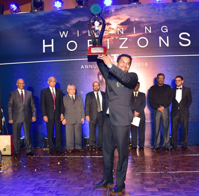 A.C.M. Ramzan with the "Champion of Champions" Trophy