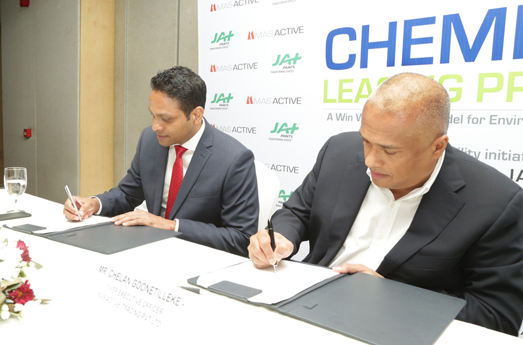 Managing Director of JAT Holdings Aelian Gunawardene (in red tie) with MAS Active CEO Chelan Goonetilleke