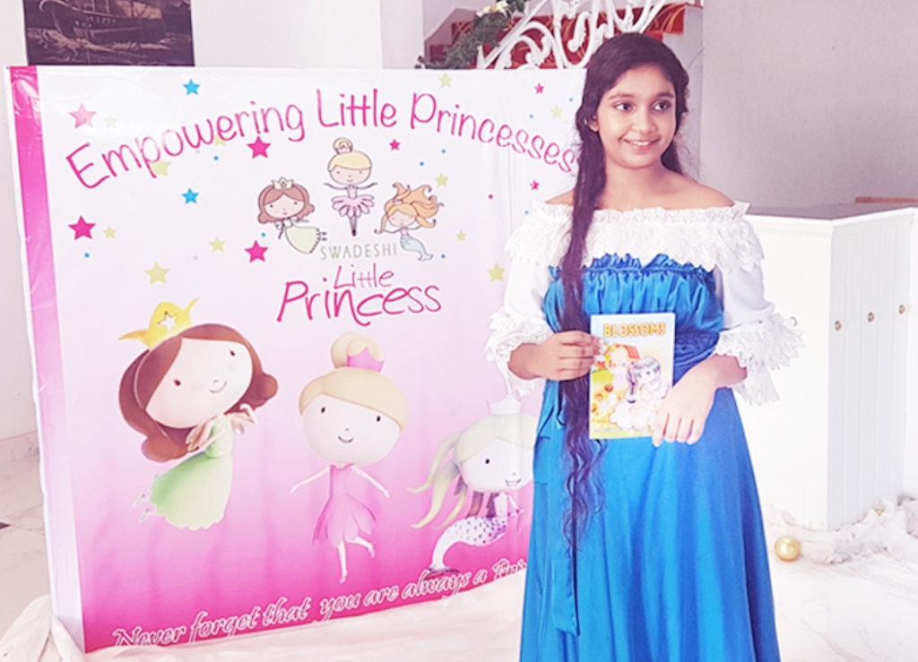 Swadeshi - Little Princess - Ashirwadi with her book