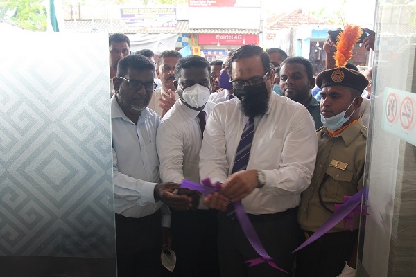 Amana Bank Chief Operating Officer Imtiaz Iqbal opening the Thoppur Self Banking Centre along with the Bank Staff and customers
