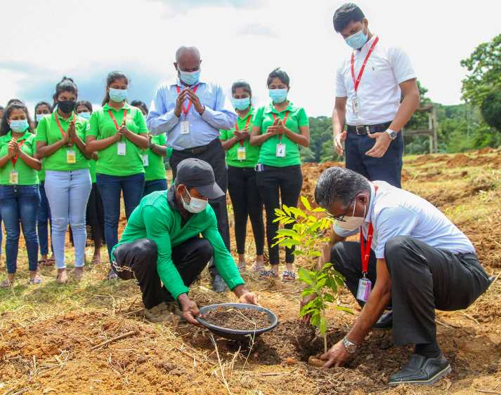 3. Ahamed Ilthimas, Group Head of Engineering of Brandix plants the first of 3,000 trees (1) (LBN Fill)