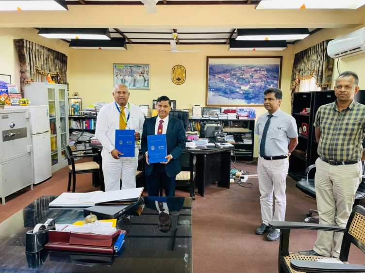 Mr.-Gahanath-Pandithage-Group-CEO-of-DIMO-and-Senior-Professor-Sujeewa-Amarasena-Vice-Chancellor-of-University-of-Ruhuna-exchanging-the-agreements-LBN-Fill.jpeg