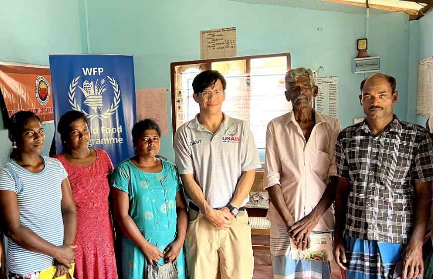 Dustin Shiau with beneficiaries in Mullativu (LBN)