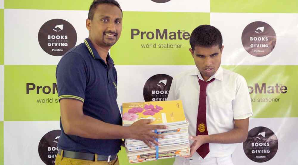 Pradeep-Perera-Business-Development-Manager-Promate-donates-used-exercise-books-to-visually-impaired-student-at-Yashodara-Deaf-and-Blind-School-Balangoda-LBN.jpeg